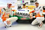 Foto zur News: Adrian Sutil (Force India) und Paul di Resta (Force India) stehen vor dem 100. Grand Prix ihres Teams