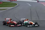 Foto zur News: Adrian Sutil (Force India) und Felipe Massa (Ferrari)