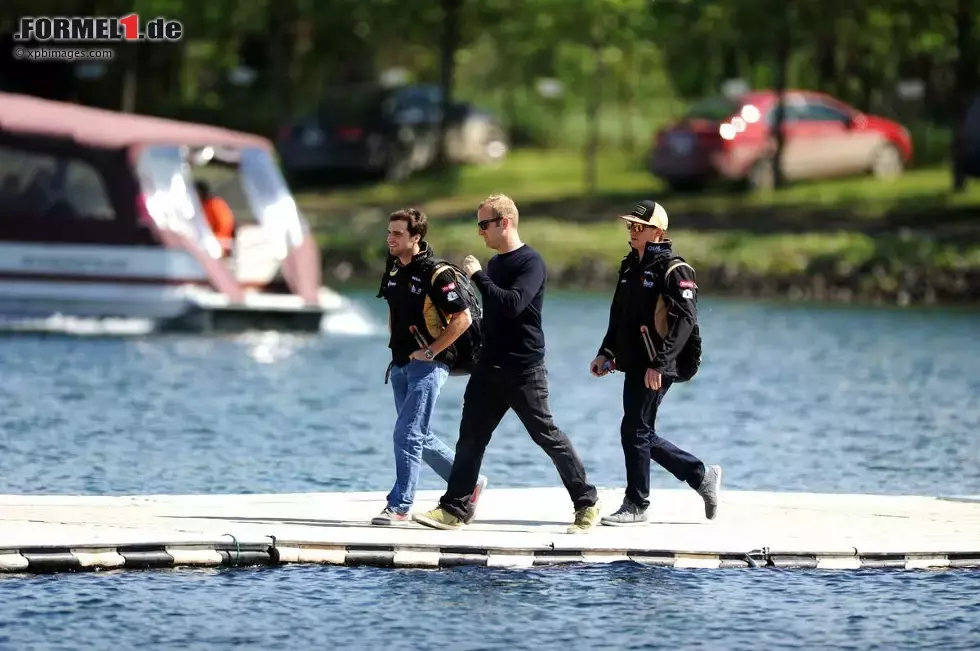 Foto zur News: Jerome D&#039;Ambrosio (Lotus) und Kimi Räikkönen (Lotus)