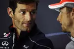 Foto zur News: Mark Webber (Red Bull) und Jenson Button (McLaren)