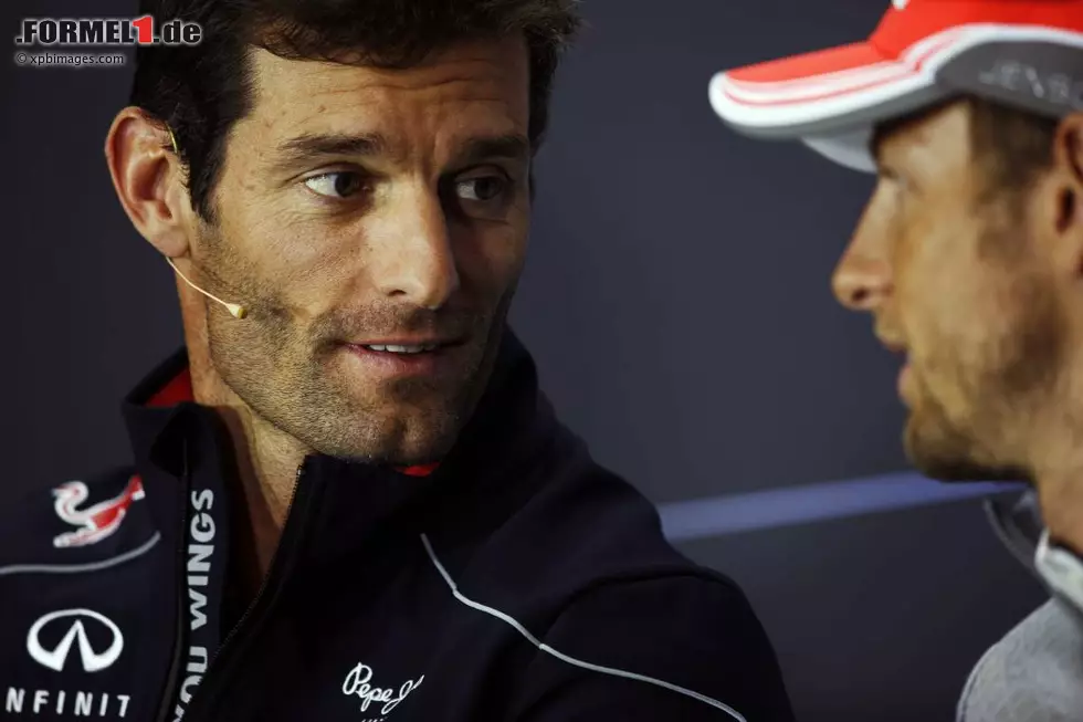 Foto zur News: Mark Webber (Red Bull) und Jenson Button (McLaren)