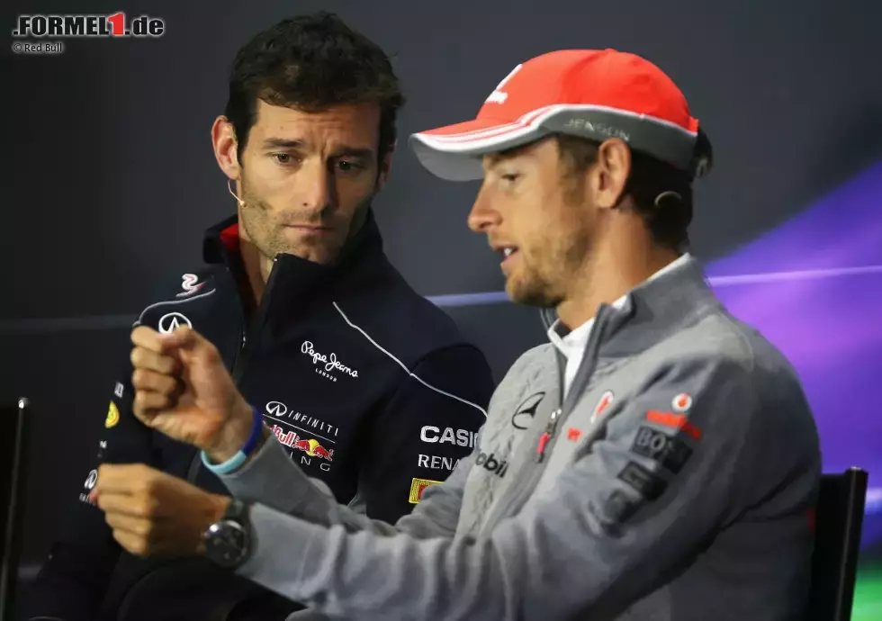 Foto zur News: Mark Webber (Red Bull) und Jenson Button (McLaren)