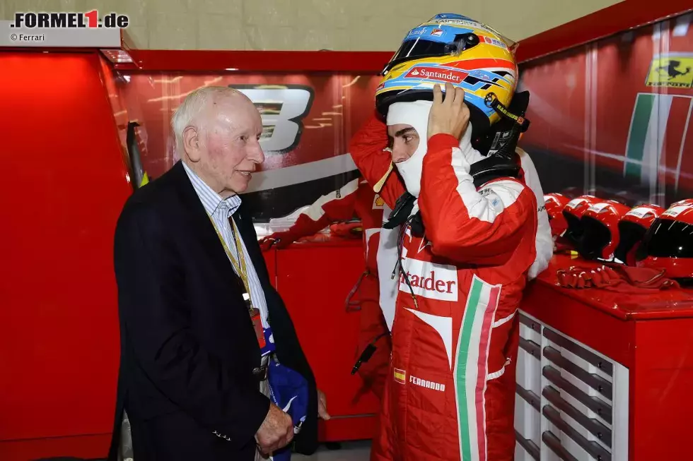 Foto zur News: John Surtees und Fernando Alonso (Ferrari)