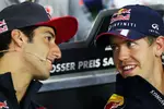 Foto zur News: Daniel Ricciardo (Toro Rosso) und Sebastian Vettel (Red Bull)