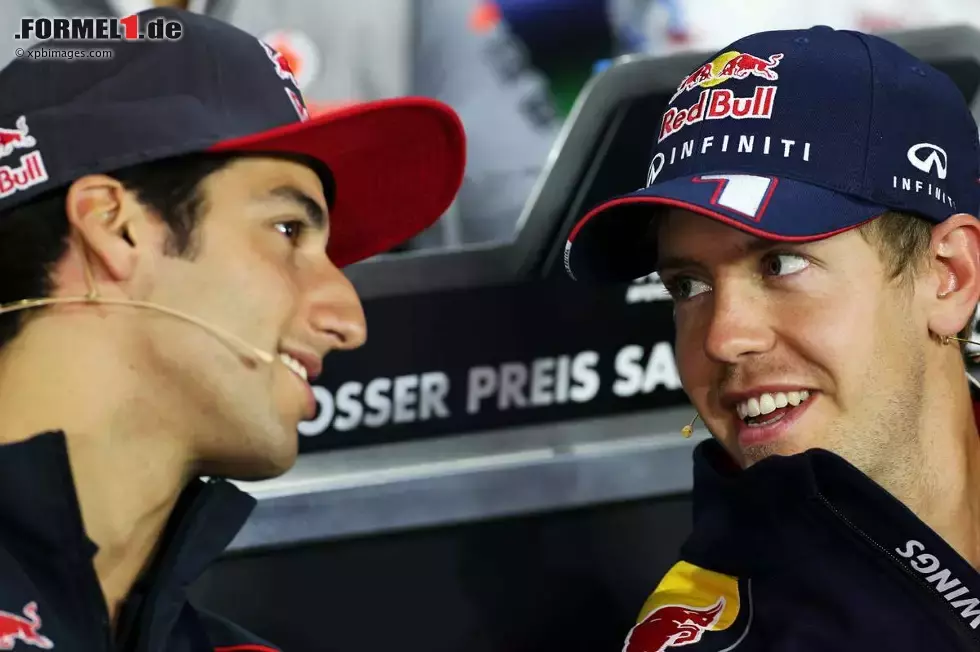 Foto zur News: Daniel Ricciardo (Toro Rosso) und Sebastian Vettel (Red Bull)