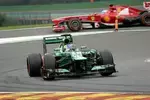 Foto zur News: Charles Pic (Caterham) und Fernando Alonso (Ferrari)