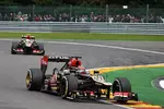 Foto zur News: Romain Grosjean (Lotus) und Kimi Räikkönen (Lotus)