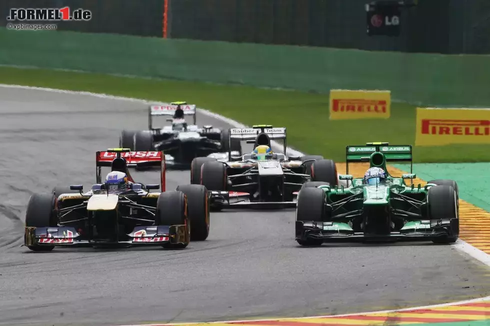 Foto zur News: Daniel Ricciardo (Toro Rosso) und Giedo van der Garde (Caterham)