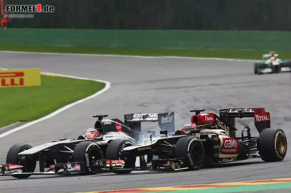 Foto zur News: Nico Hülkenberg (Sauber) und Kimi Räikkönen (Lotus)