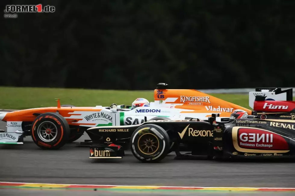 Foto zur News: Paul di Resta (Lotus) und Kimi Räikkönen (Force India)