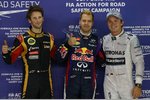 Foto zur News: Sebastian Vettel (Red Bull), Nico Rosberg (Mercedes) und Romain Grosjean (Lotus)