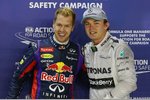 Foto zur News: Sebastian Vettel (Red Bull) und Nico Rosberg (Mercedes)