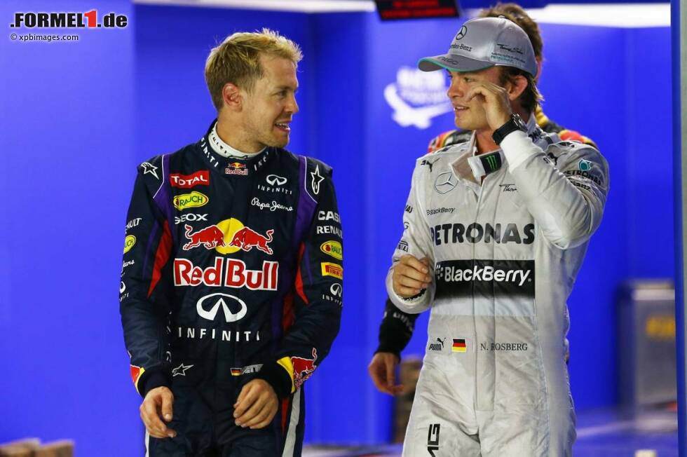 Foto zur News: Sebastian Vettel (Red Bull) und Nico Rosberg (Mercedes)