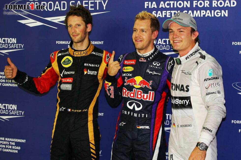 Foto zur News: Romain Grosjean (Lotus), Sebastian Vettel (Red Bull) und Nico Rosberg (Mercedes)