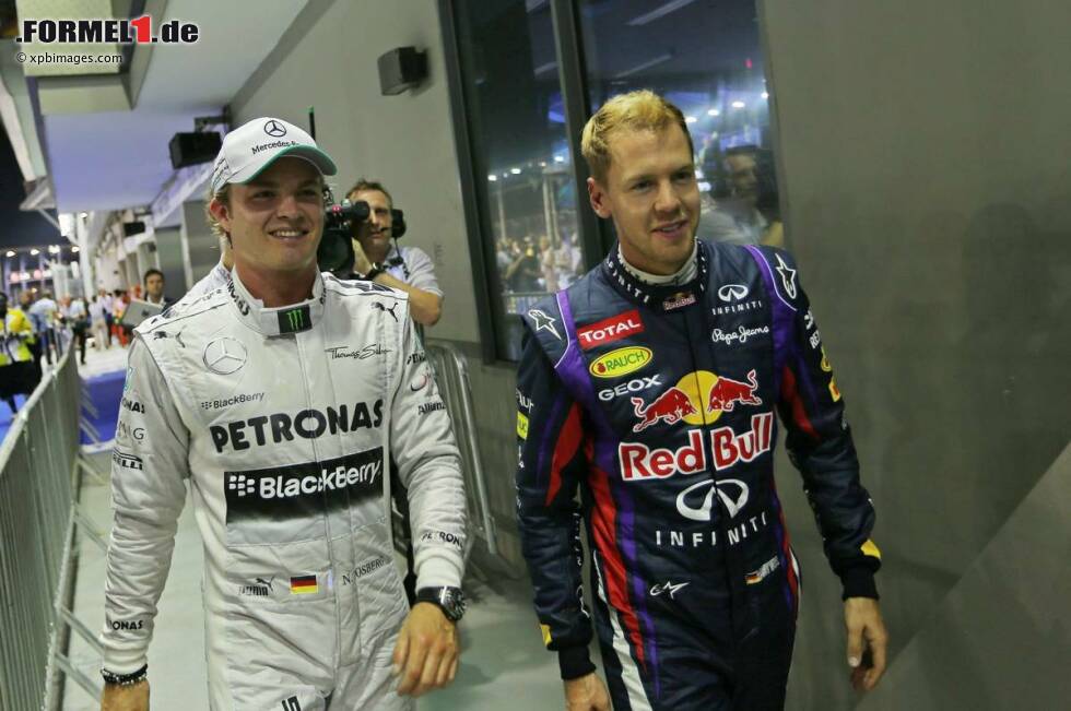 Foto zur News: Nico Rosberg (Mercedes) und Sebastian Vettel (Red Bull)