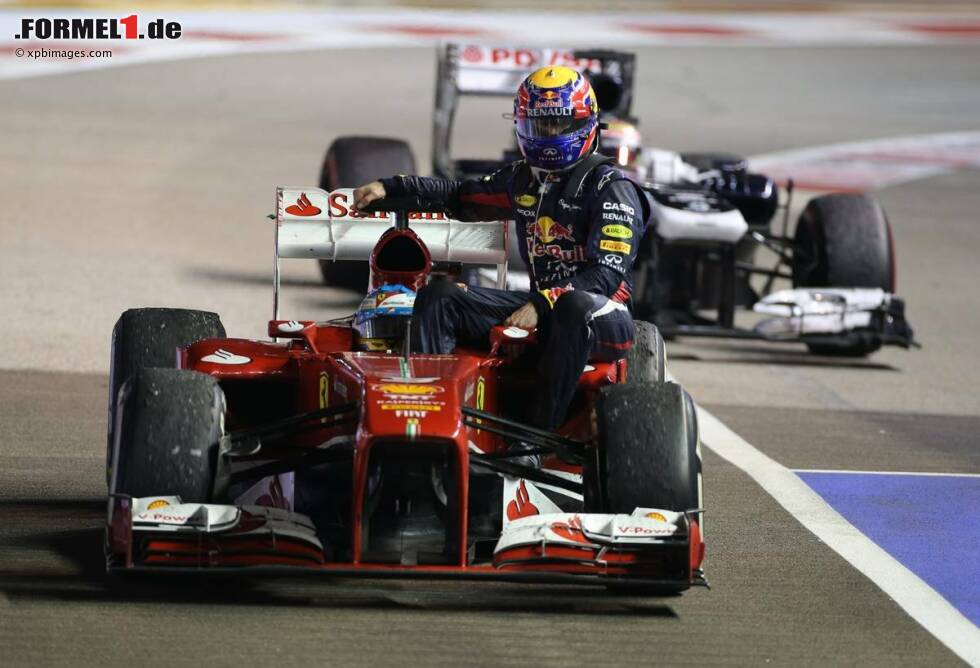 Foto zur News: Fernando Alonso (Ferrari) und Mark Webber (Red Bull)