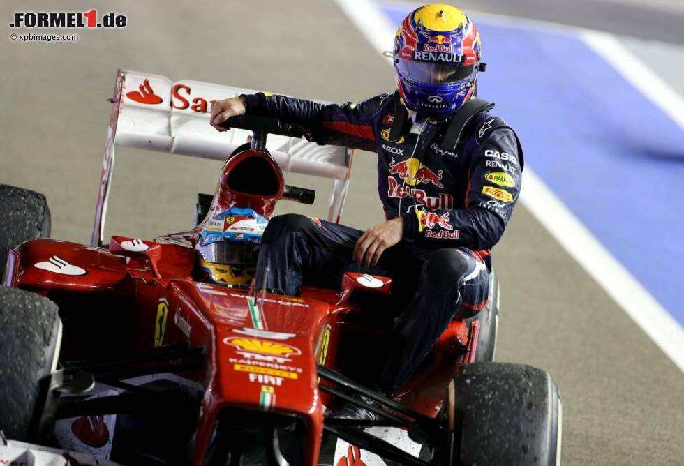 Foto zur News: Fernando Alonso (Ferrari) und Mark Webber (Red Bull)