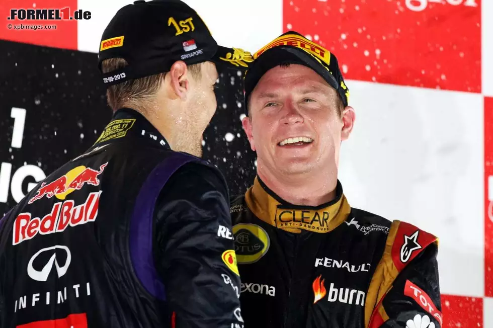 Foto zur News: Sebastian Vettel (Red Bull) und Kimi Räikkönen (Lotus)