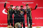 Foto zur News: Sebastian Vettel (Red Bull), Romain Grosjean (Lotus) und Kimi Räikkönen (Lotus)