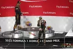 Foto zur News: Kimi Räikkönen (Lotus) und Romain Grosjean (Lotus)