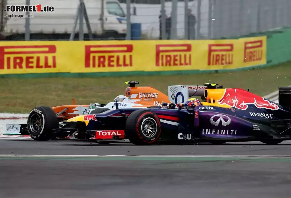 Foto zur News: Adrian Sutil (Force India) und Mark Webber (Red Bull)