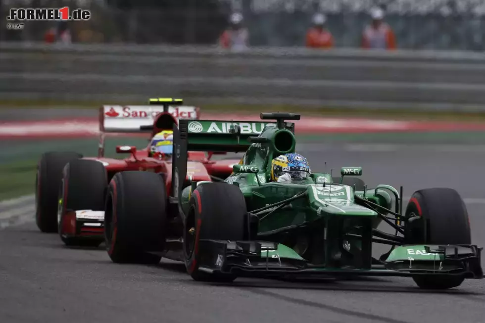 Foto zur News: Charles Pic (Caterham) und Felipe Massa (Ferrari)