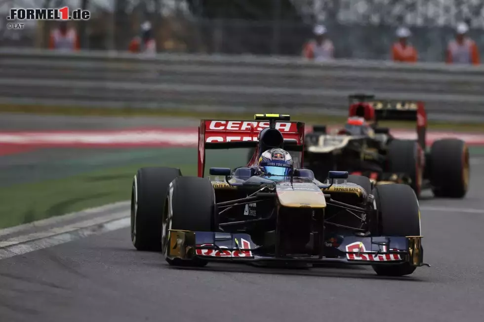 Foto zur News: Daniel Ricciardo (Toro Rosso) und Kimi Räikkönen (Lotus)