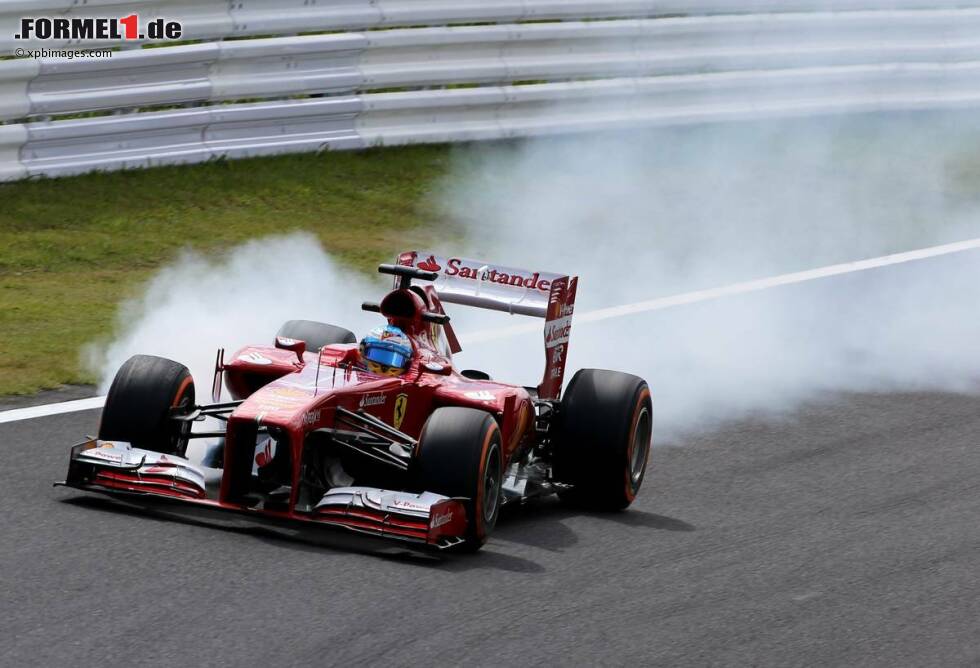 Foto zur News: Fernando Alonso (Ferrari) verbremst sich