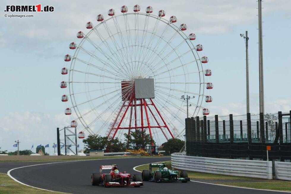 Foto zur News: Felipe Massa (Ferrari) und Giedo van der Garde (Caterham)