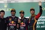 Foto zur News: Mark Webber (Red Bull), Sebastian Vettel (Red Bull) und Romain Grosjean (Lotus)