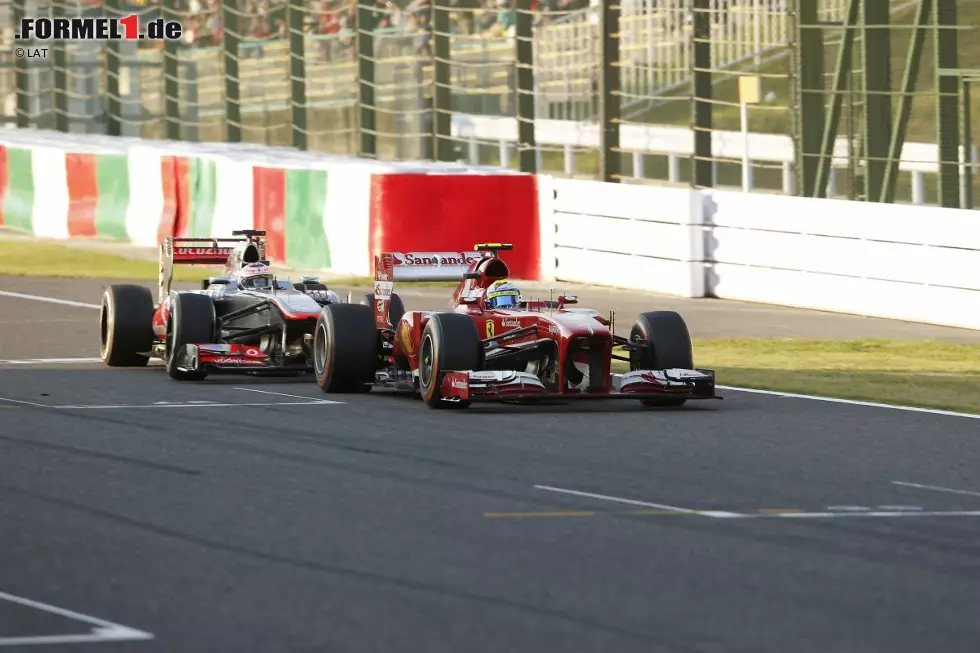 Foto zur News: Felipe Massa (Ferrari) und Jenson Button (McLaren)