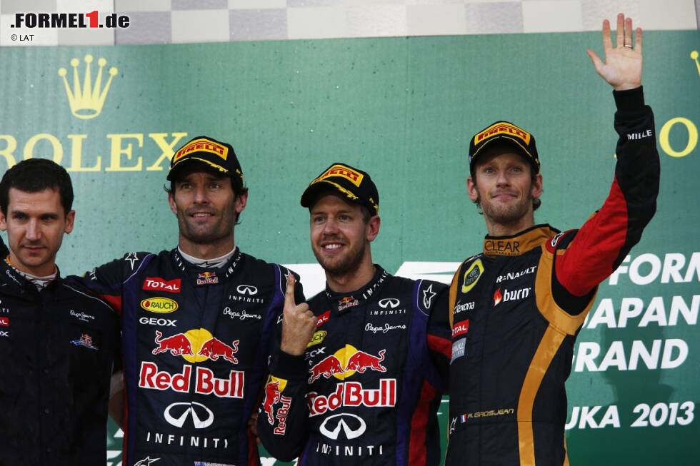 Foto zur News: Mark Webber (Red Bull), Sebastian Vettel (Red Bull) und Romain Grosjean (Lotus)