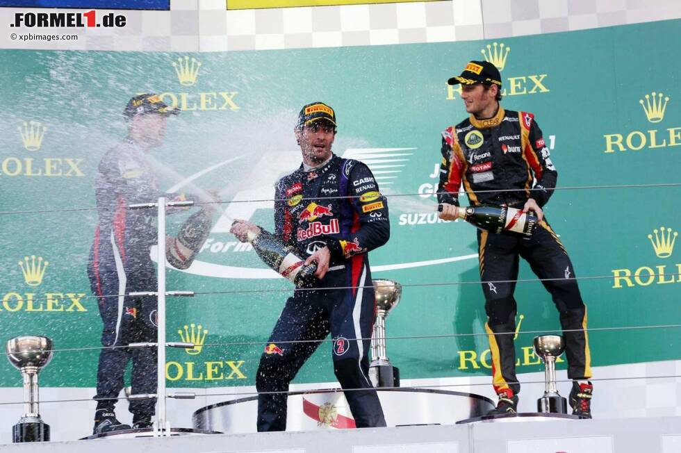 Foto zur News: Mark Webber (Red Bull), Sebastian Vettel (Red Bull) und Romain Grosjean (Lotus)