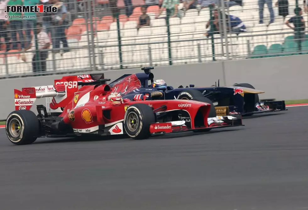 Foto zur News: Fernando Alonso (Ferrari) und Jean-Eric Vergne (Toro Rosso)