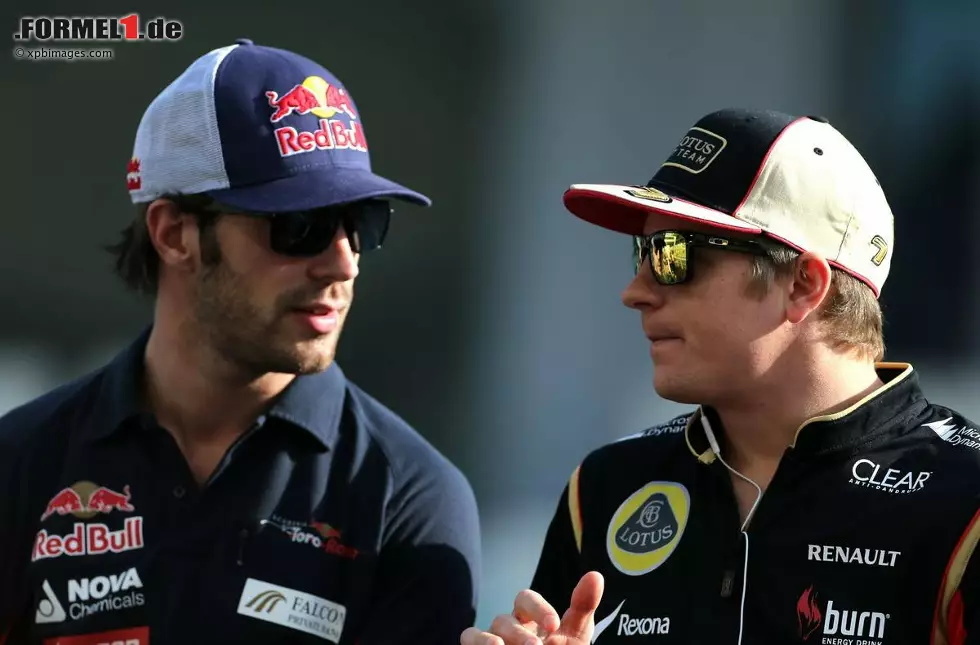 Foto zur News: Kimi Räikkönen (Lotus) und Jean-Eric Vergne (Toro Rosso)