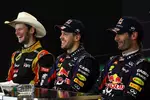 Foto zur News: Romain Grosjean (Lotus), Sebastian Vettel (Red Bull) und Mark Webber (Red Bull)