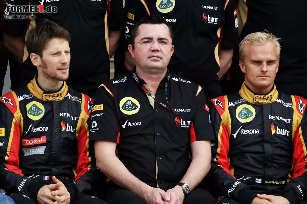 Foto zur News: Romain Grosjean (Lotus), Eric Boullier und Heikki Kovalainen (Lotus)