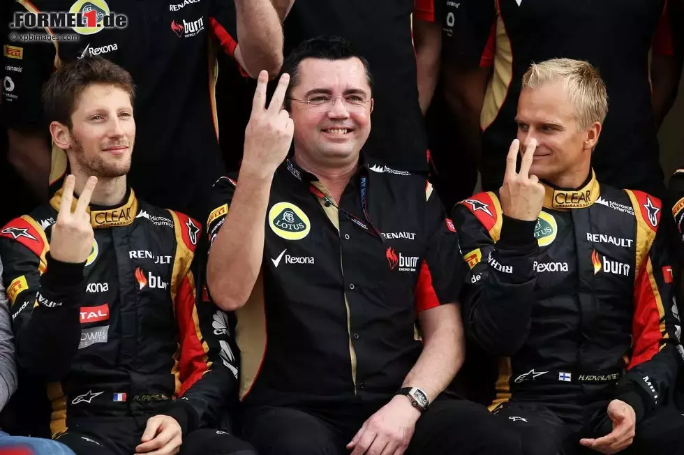 Foto zur News: Romain Grosjean (Lotus), Eric Boullier und Heikki Kovalainen (Lotus)