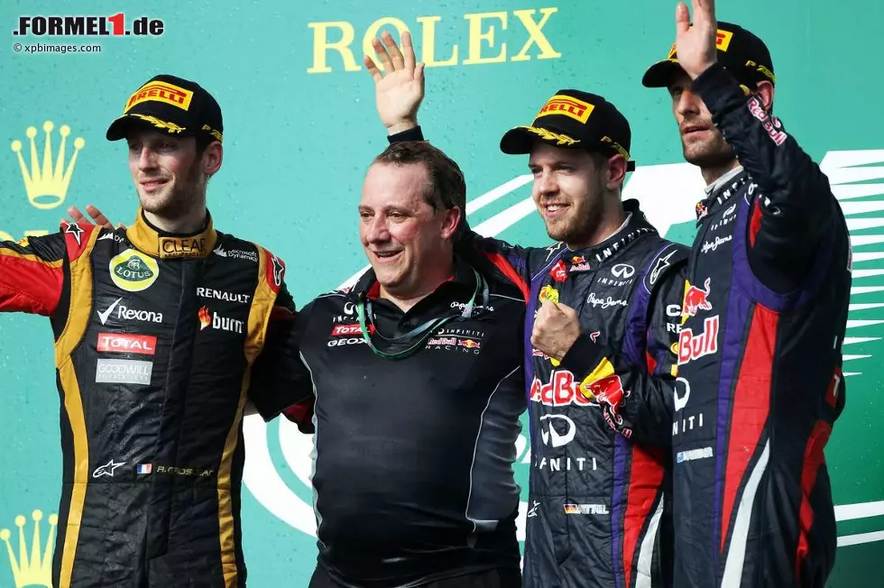 Foto zur News: Romain Grosjean (Lotus), Sebastian Vettel (Red Bull) und Mark Webber (Red Bull)