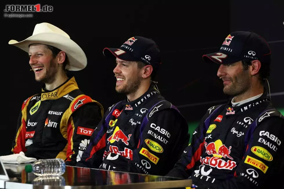 Foto zur News: Romain Grosjean (Lotus), Sebastian Vettel (Red Bull) und Mark Webber (Red Bull)