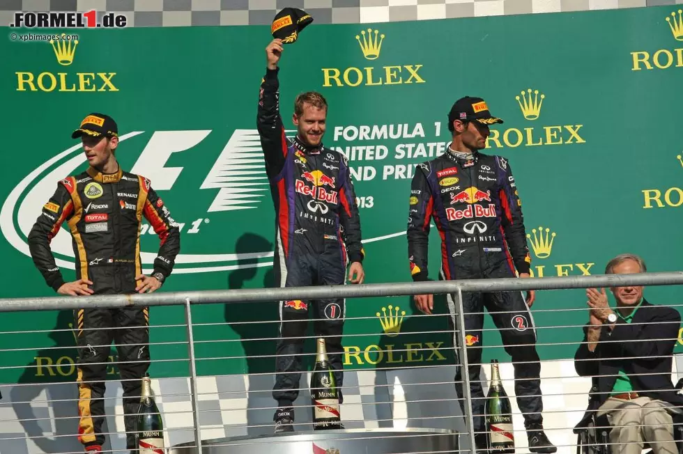 Foto zur News: Romain Grosjean (Lotus), Sebastian Vettel (Red Bull) und Mark Webber (Red Bull)