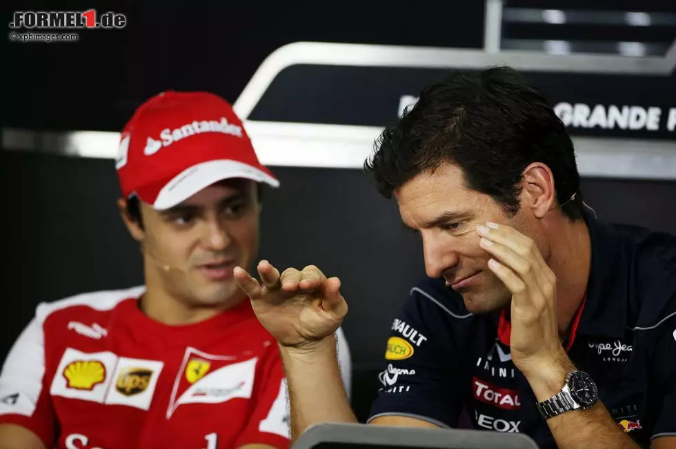 Foto zur News: Felipe Massa (Ferrari) und Mark Webber (Red Bull)