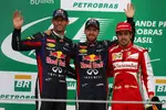 Foto zur News: Sebastian Vettel (Red Bull) holt auch den Sieg im Saisonfinale vor Mark Webber (Red Bull) und Fernando Alonso (Ferrari)