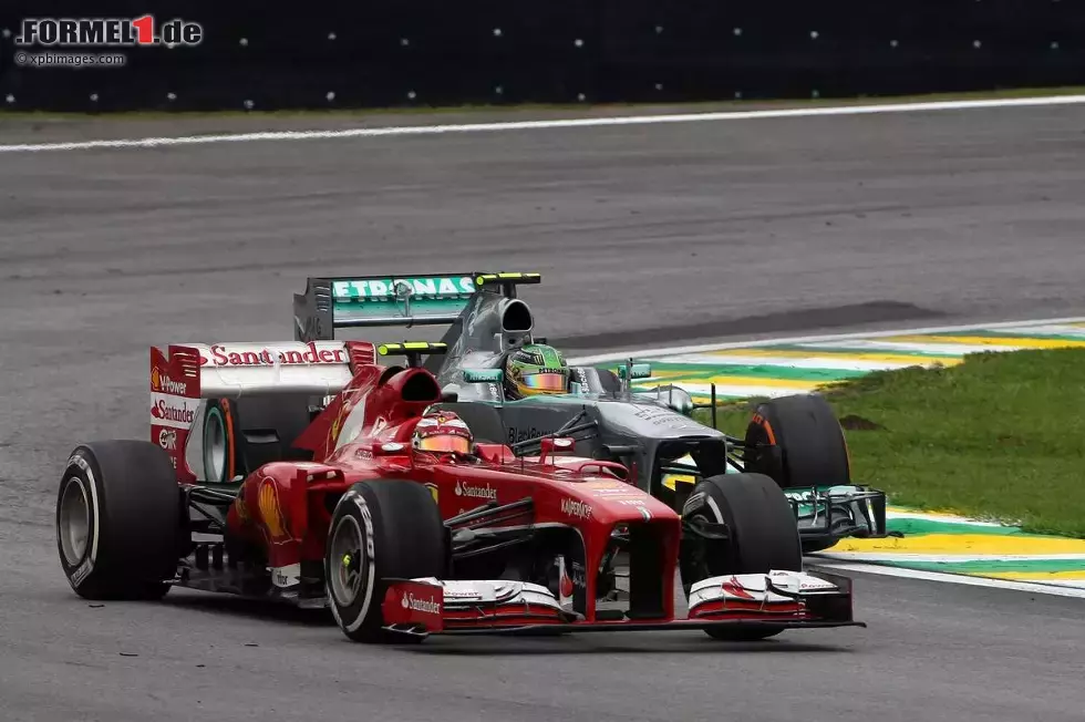 Foto zur News: Felipe Massa (Ferrari) und Lewis Hamilton (Mercedes)