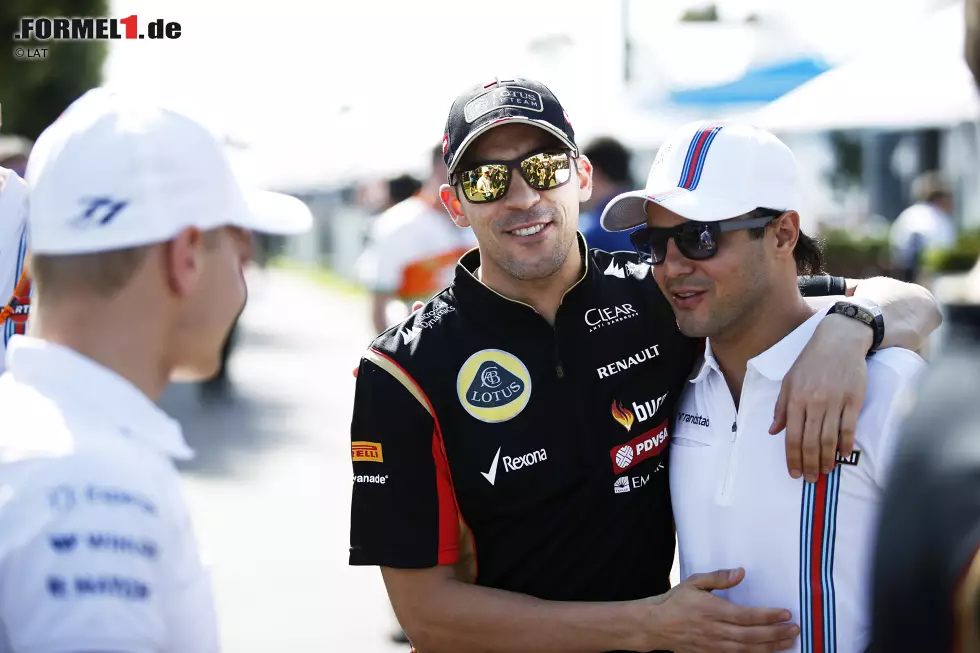 Foto zur News: Pastor Maldonado (Lotus) und Felipe Massa (Williams)