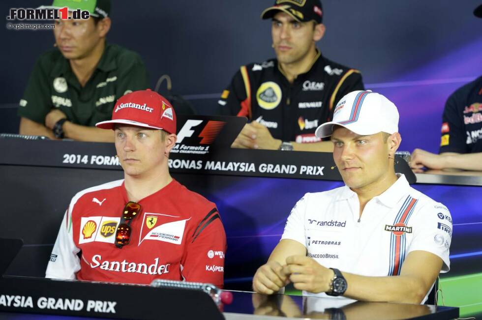Foto zur News: Finnen unter sich: Valtteri Bottas (Williams) und Kimi Räikkönen (Ferrari)