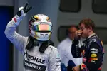 Foto zur News: Lewis Hamilton (Mercedes) und Sebastian Vettel (Red Bull)