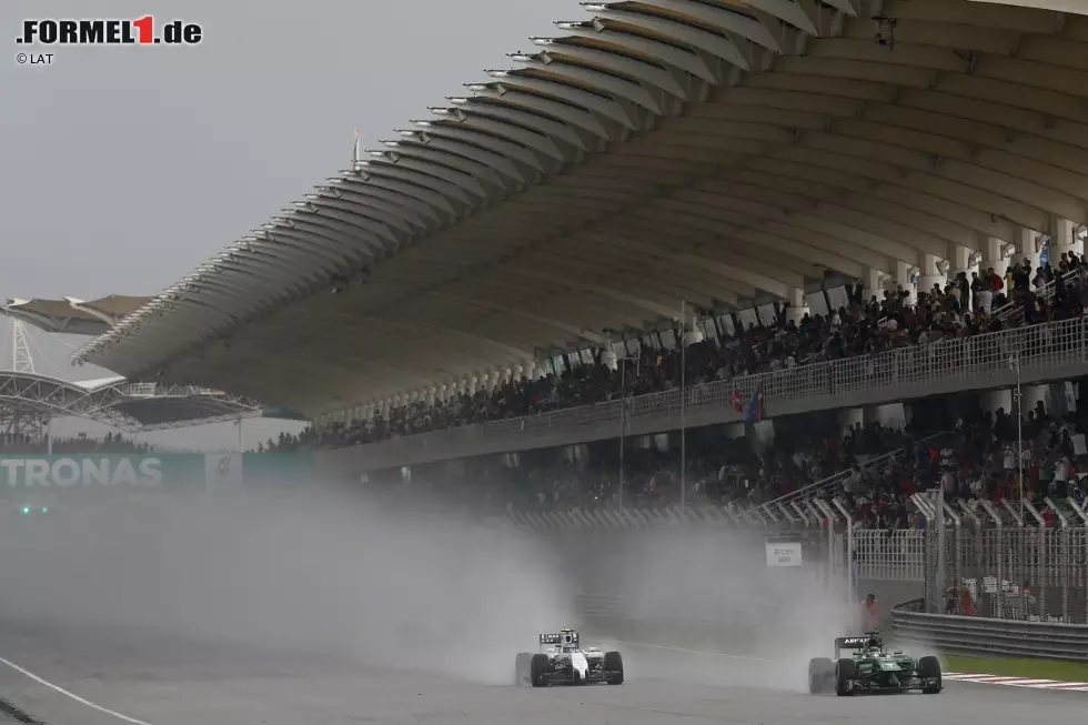 Foto zur News: Kamui Kobayashi (Caterham) und Valtteri Bottas (Williams)