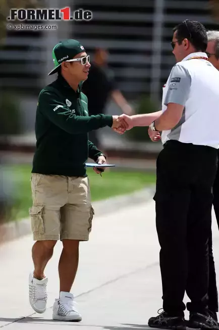 Foto zur News: Kamui Kobayashi (Caterham) und Eric Boullier