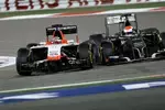 Foto zur News: Jules Bianchi (Marussia) und Adrian Sutil (Sauber)